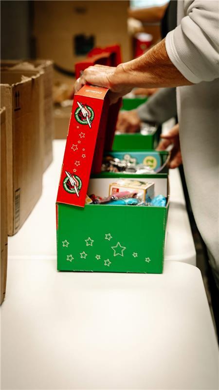 Retire SMART Community Packs 300 Shoeboxes for Children Through Operation Christmas Child